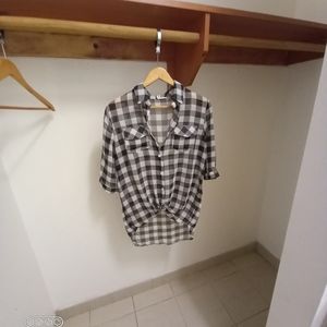 See threw checkered button up